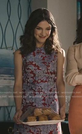 Alicia’s red floral sleeveless dress on Grand Hotel