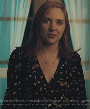 Violet’s black floral button down blouse on Light as a Feather