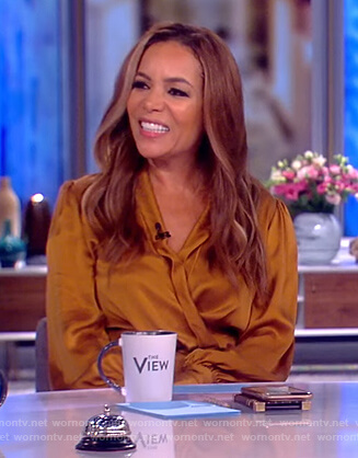 Sunny’s brown satin wrap dress on The View