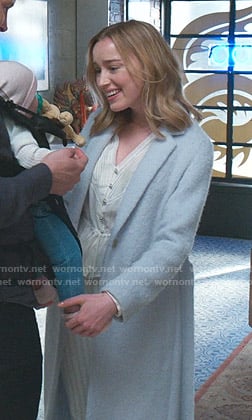 Clare’s v-neck blouse and blue wrap coat on Younger