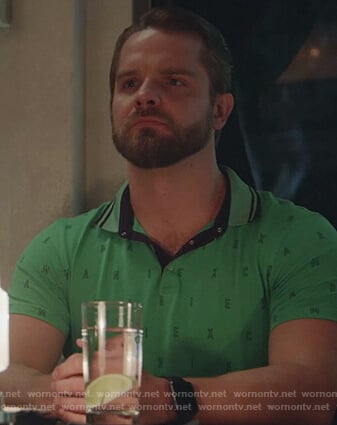 Evan’s green letter print polo on Good Trouble