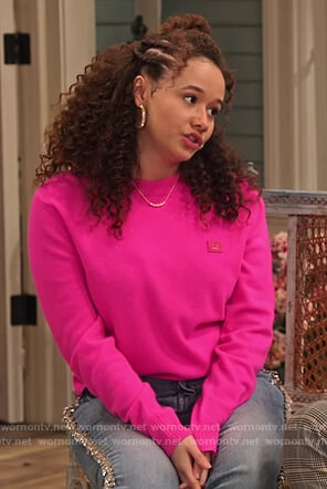 Jade’s pink face sweater on Family Reunion