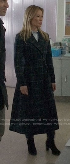 Joan’s long checked coat on Elementary