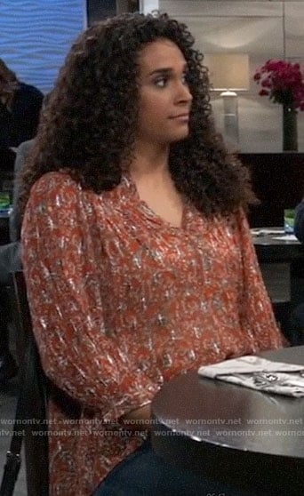 Jordan’s orange metallic blouse on General Hospital