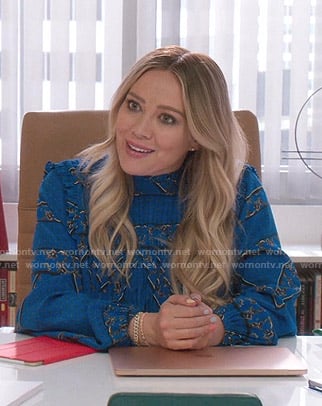 Kelsey’s blue print pleated blouse on Younger