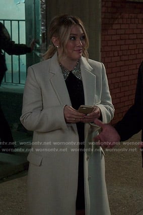 Kelsey’s white coat on Younger