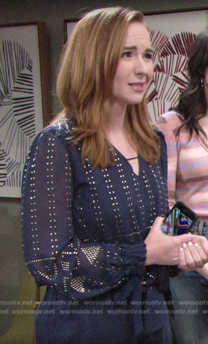 Mariah’s navy embellished blouse on The Young and the Restless