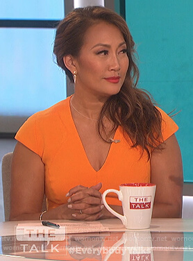 Carrie’s orange v-neck sheath dress on The Talk