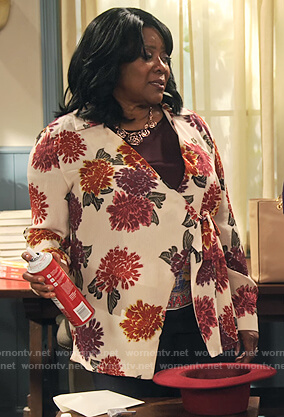 MDear’s white floral wrap blouse on Family Reunion