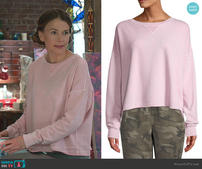 AMO Denim Cropped Raw-Edge Pullover Sweatshirt worn by Liza Miller (Sutton Foster) on Younger