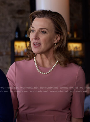 Nora’s pink ruffled waist dress on 13 Reasons Why