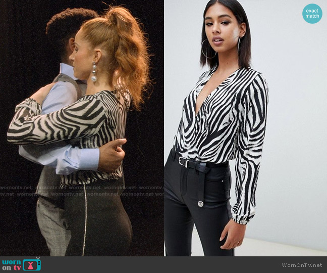 Pretty Little Thing Chiffon Wrap Body in Zebra Print worn by Zara (Sophia La Porta) on Four Weddings and a Funeral