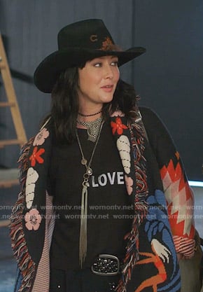 Shannen’s black Love tee and embroidered cardigan on BH90210