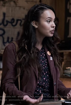 Jessica’s purple jacket and black floral top on 13 Reasons Why