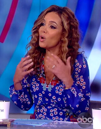 Sunny’s blue floral v-neck dress on The View