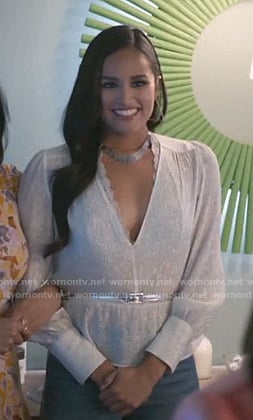 Carolina’s metallic v-neck peplum top on Grand Hotel