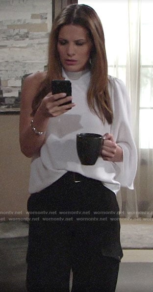 Chelsea’s white one-shoulder blouse and black cargo pants on The Young and the Restless