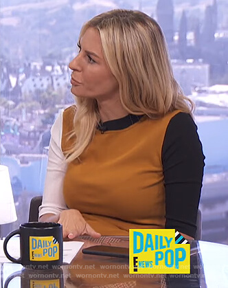 Morgan’s orange colorblock shirt on E! News Daily Pop