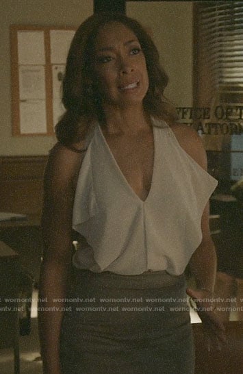 Jessica’s white ruffle front sleeveless top on Pearson