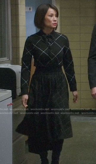 Joan’s black mixed check dress on Elementary
