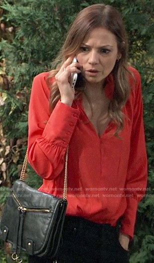 Kim’s red split-neck top on General Hospital