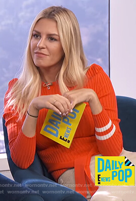 Morgan’s red tie waist sweater on E! News Daily Pop