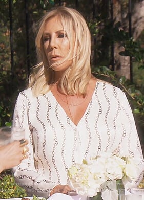 Vicki’s white chain print blouse on The Real Housewives of Orange County