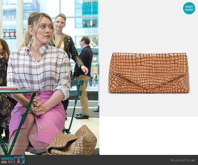 Dries Van Noten Crocodile-Stamped Large Patent Leather Clutch worn by Kelsey Peters (Hilary Duff) on Younger