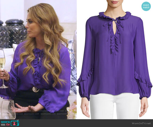 Kobi Halperin Angie Ruffle-Neck Blouse worn by D’Andra Simmons on The Real Housewives of Dallas