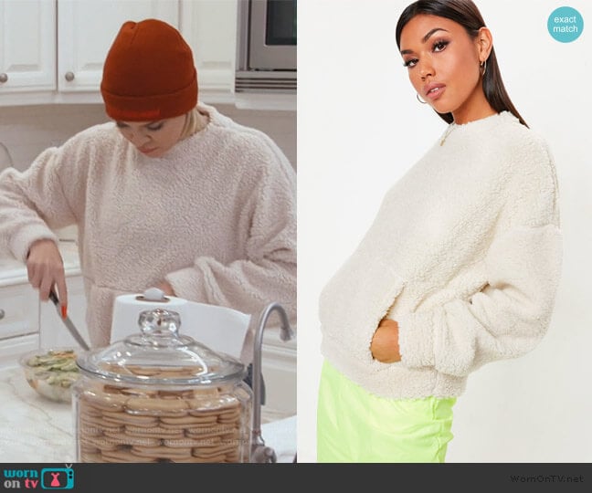 Missguided Rust Teddy High Neck Cropped Sweatshirt worn by Khloe Kardashian on Keeping Up with the Kardashians