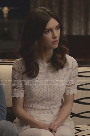 Alicia’s white lace embroidered top on Grand Hotel