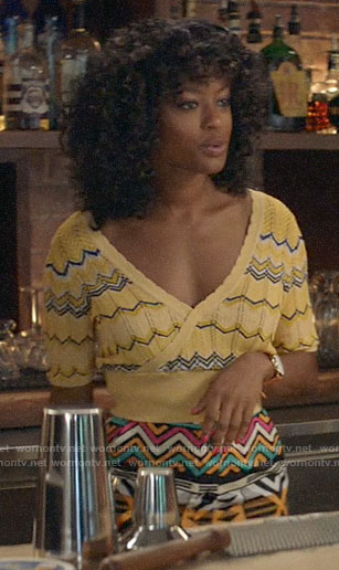 Ali’s yellow chevron stripe knit top on God Friended Me