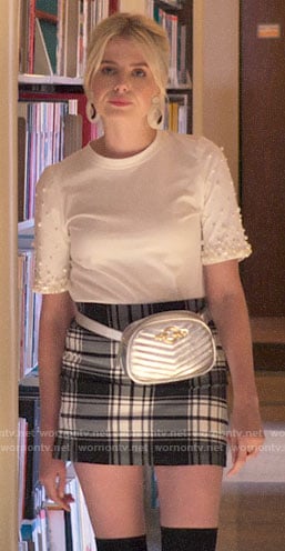 Astrid’s white pearl embellished top and plaid skirt on The Politician