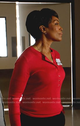 Athena’s red ribbed henley sweater on 9-1-1