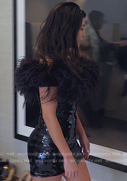 Kourtney’s feather embellished mini dress on Keeping Up with the Kardashians