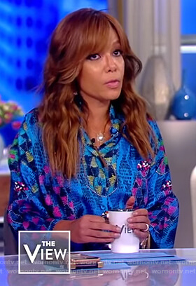 Sunny’s blue printed satin dress on The View