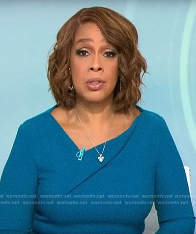 Gayle’s teal blue asymmetric v-neck dress on CBS This Morning