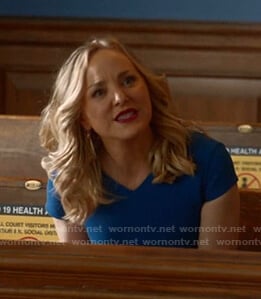 Marissa’s blue v-neck dress on Bull