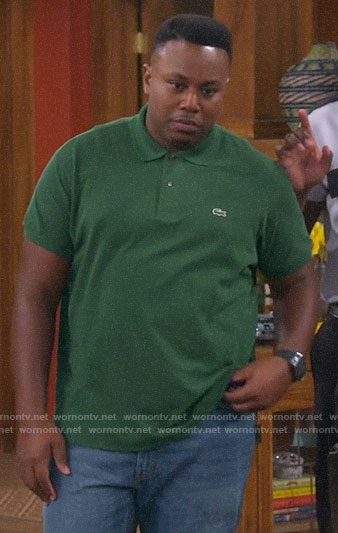 Marty’s green polo shirt on The Neighborhood