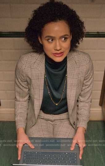 Maya’s plaid suit and draped top on Four Weddings and a Funeral