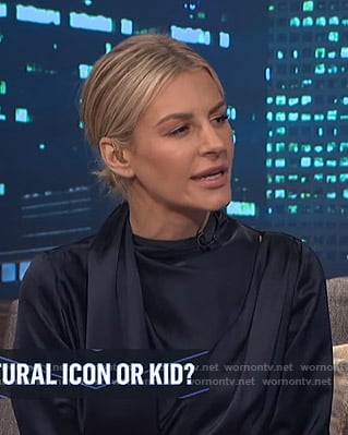 Morgan’s navy tie neck mini dress on E! News Nightly Pop