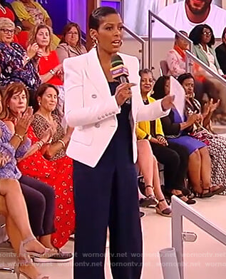 Tamron’s blue jumpsuit and white blazer on the Tamron Hall Show