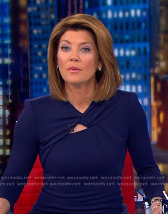 Norah’s navy knotted neck dress on CBS Evening News