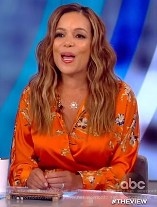 Sunny’s orange floral wrap dress on The View