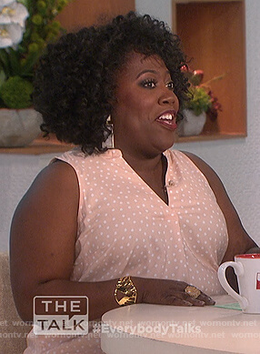 Sheryl’s pink polka dot top on The Talk