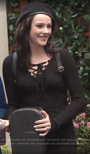 Tessa’s black lace-up dress on The Young and the Restless