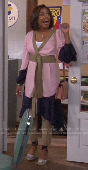 Tina’s pink colorblock wrap dress on The Neighborhood