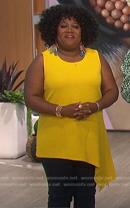 Sheryl’s yellow asymmetric top on The Talk