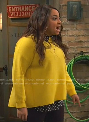 Raven’s yellow sweater with back zip on Ravens Home