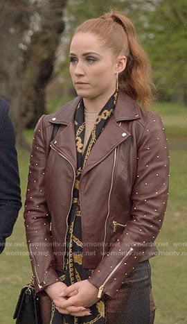 Zara’s burgundy leather jacket with studded sleeves on Four Weddings and a Funeral